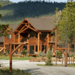 FAQs Contact Cabin Creek Landing B&B entrance with view of the lodge